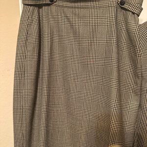 2 pc window pane double breasted tabbed cuff jacket. Matching the knee skirt